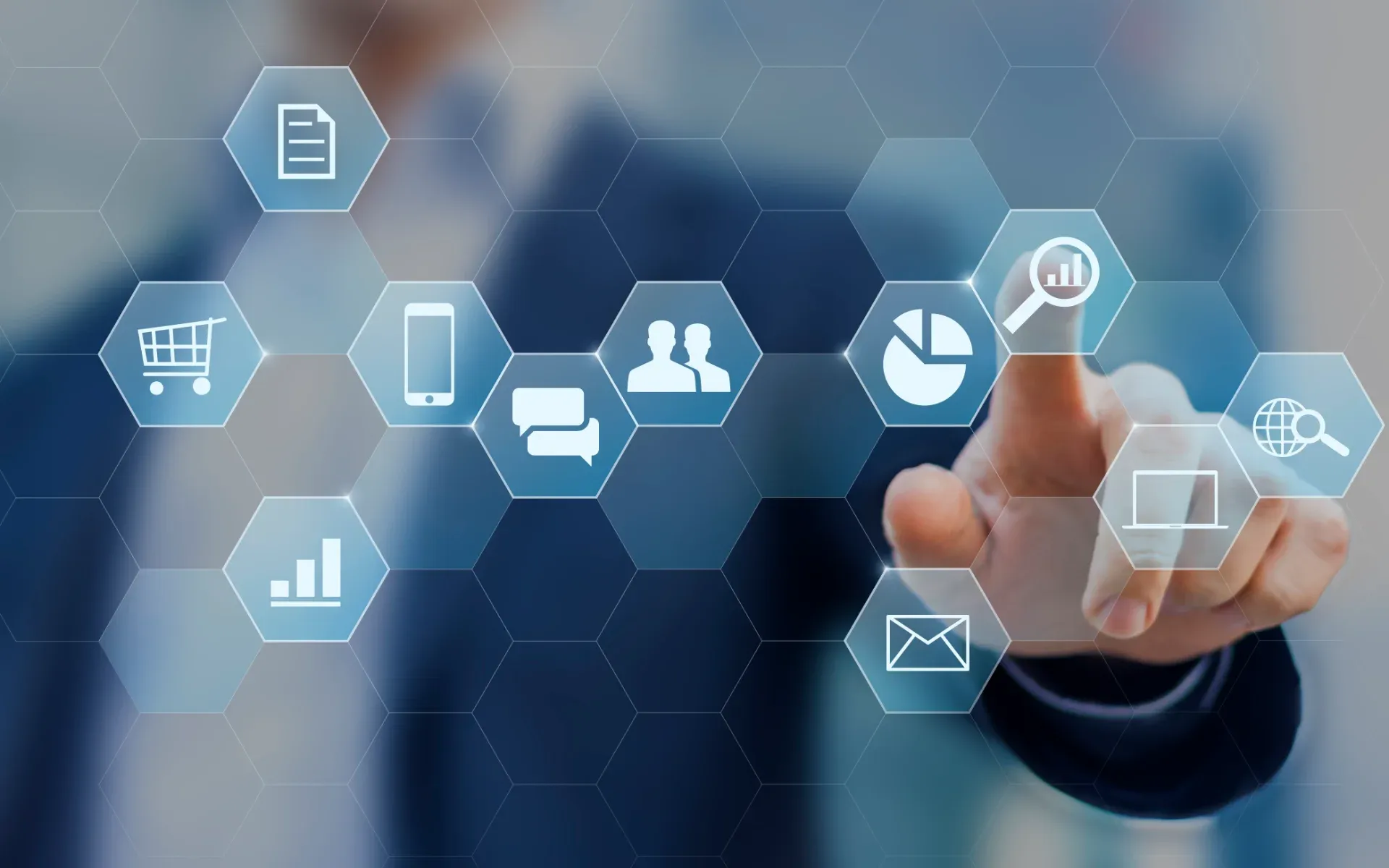 Hand touching digital icons for marketing, analytics and communication